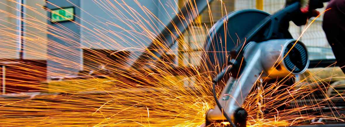 cut off saw cutting metal with sparks