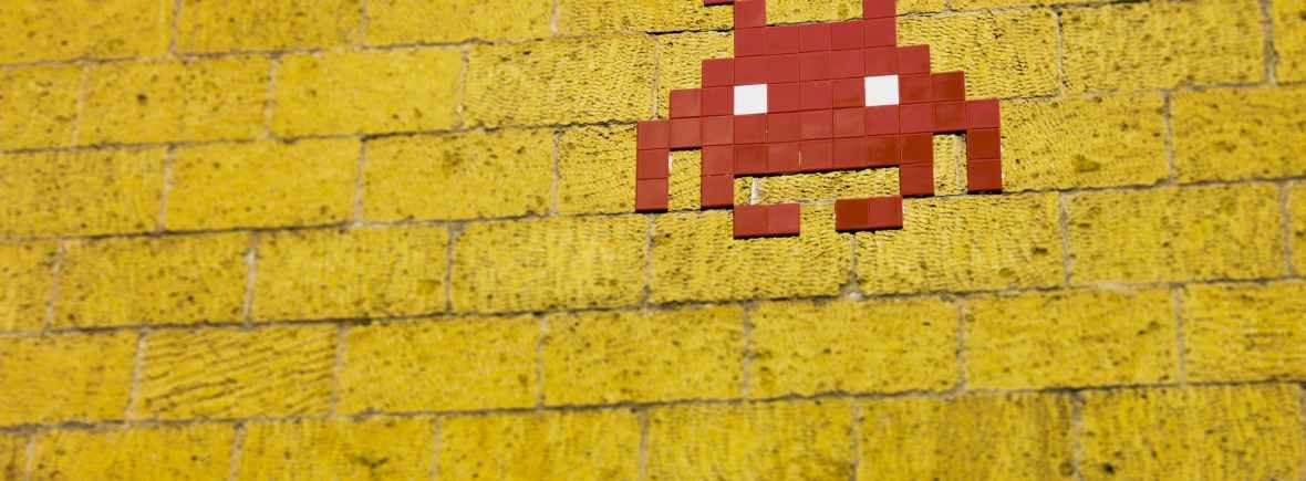 mosaic alien on wall